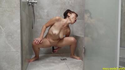 Crazy asian grandma toying at the shower on vidgratis.com