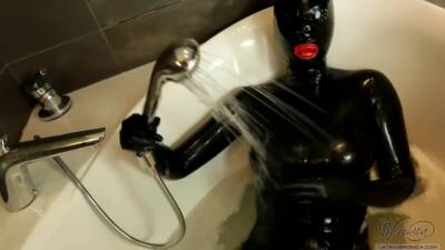 Sexy Black Rubberdoll In Bath on vidgratis.com