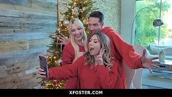 Cute Adopted Daughter Joins Her Foster Parents For Christmas Fuck on vidgratis.com