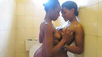 African Cuties Eating Pussy and Fingering in Shower on vidgratis.com