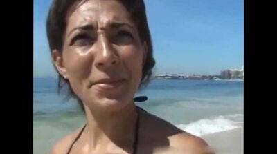 Tanned cougar was picked up on a public beach for kinky sex and a facial - Germany - Brazil on vidgratis.com