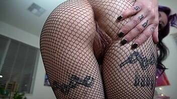 Tatted Slut Shows Off Tight Asshole In Fishnets on vidgratis.com