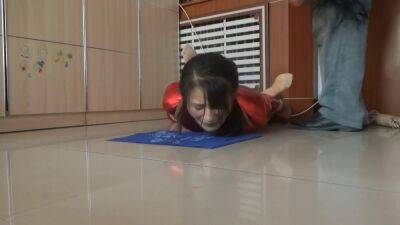 Sluty Asian girl enjoys BDSM and whipping on a floor on vidgratis.com