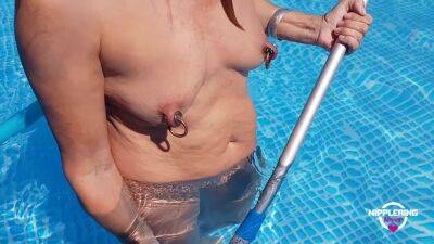 Nippleringlover Horny Milf Nude Cleaning The Pool Extreme Stretched Pierced Nipples on vidgratis.com