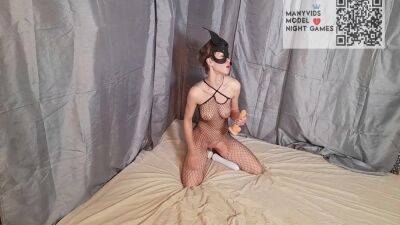 Girl In A Mask And A Mesh On The Body Sucks And Fucks A Dildo on vidgratis.com