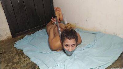 Hysterical Bondage Prisoner Hogtied Naked And Squirming In The Basement! on vidgratis.com