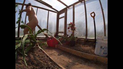 Naked Greenhouse Worker Planting Cacti on vidgratis.com