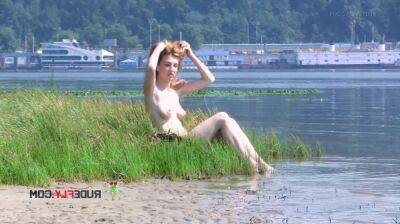 Playful blond nudist teen caught on camera naked at the beach on vidgratis.com