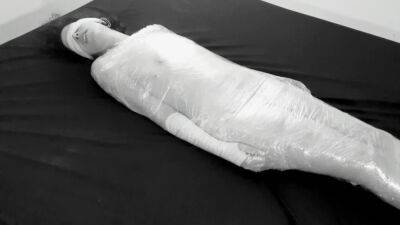 Mummified in plastic wrap girl gets fucked and squirts after fingering on vidgratis.com