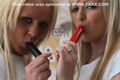 Two Teenage Blondes Dressed Appropriate For The Christmas Spirit - Usa on vidgratis.com