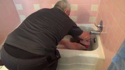 Lovely Ashley Is Hogtied And Humiliated In Bathtub on vidgratis.com