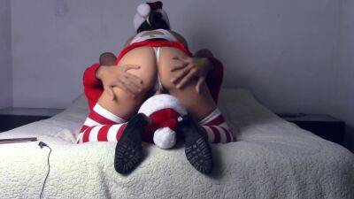 Lady Claus Dresses Up And Delivers The First Christmas Present on vidgratis.com