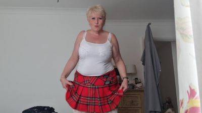 Tartan Skirt Stockings And White See Thru Panties on vidgratis.com