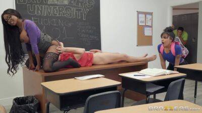 Bosomed black teacher with glasses gets eaten out and screwed in the classroom on vidgratis.com
