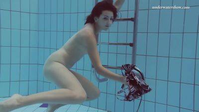 Sensational Sima Lastova In Poolside Swim Session on vidgratis.com