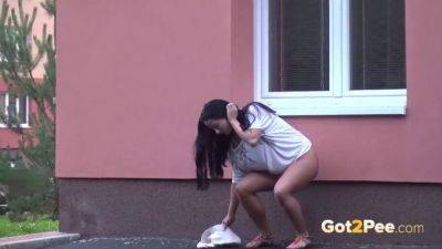 Brunette hottie pees in public while getting her shaved pussy soaked - Czech Republic on vidgratis.com