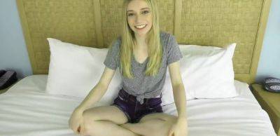 This cute model is 18 yrs old with some massive 32DD natural boobs on vidgratis.com