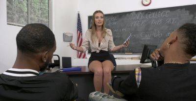 Appealing MILF teacher gets busy with two black studs on vidgratis.com