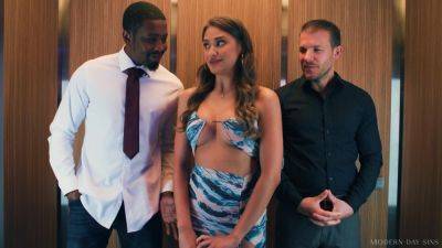 Elegant chick fucked in the elevator by two horny studs on vidgratis.com