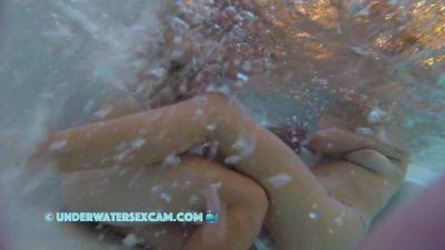 This Beautiful Couple Relaxes In The Hot Tub Of A Public Nudist Resort on vidgratis.com