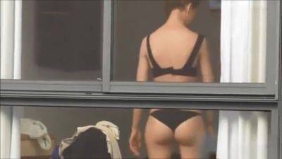 Spying on neighbour undressing. on vidgratis.com