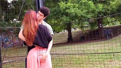 Redhead Teen Lenarica Fucks Big Cock Kyle in University Courtyard on vidgratis.com